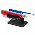 GAMESVN Everyday Comb Kit: red, blue, white and black combs in the black Klasico & Co. top-loading stand. Model-based product render.